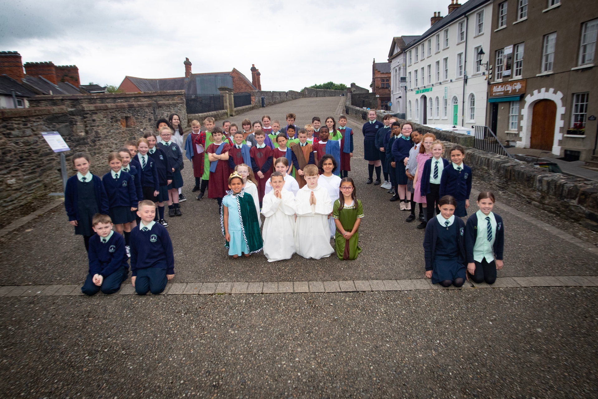 Children from the Long Tower and Fountain Primary Schools who took part in the 'St. Columba' pageant at the Playhouse.
