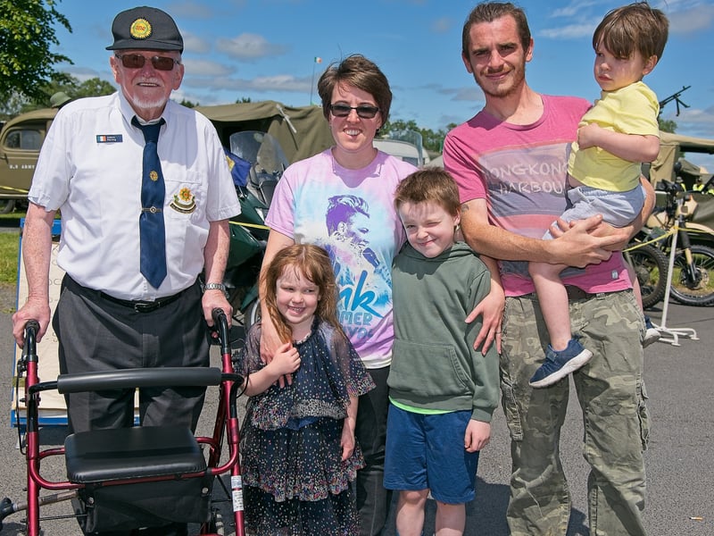 Isidore Fleming ONE (Óglaigh Náisiúnta na hÉireann) with Anderson family, Aoife, Payton, Wyatte, Elijah and Ryan, at the Irish Military Vehicles Group, Military Show 2024, at Naas Racecourse, Saturday, June 22.