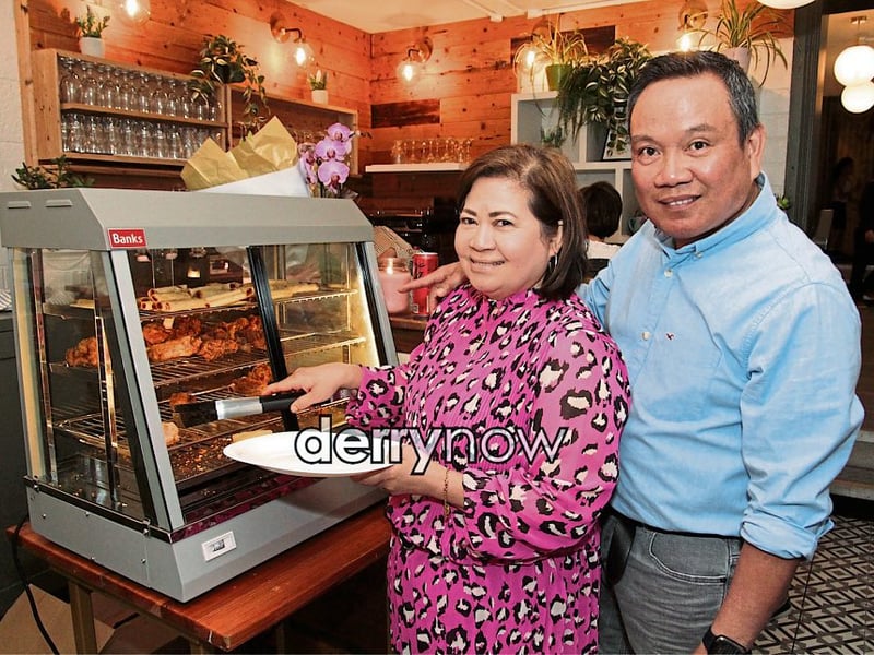 Joseph and Ralyn Petingco, proprietors of Bahay Kusina serving up the delicious Filipino food.