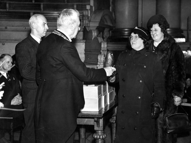 Lord Mayor Charles Boyle is pictured in December 1939 presenting the first ARP badges in the Leeds Town Hall.