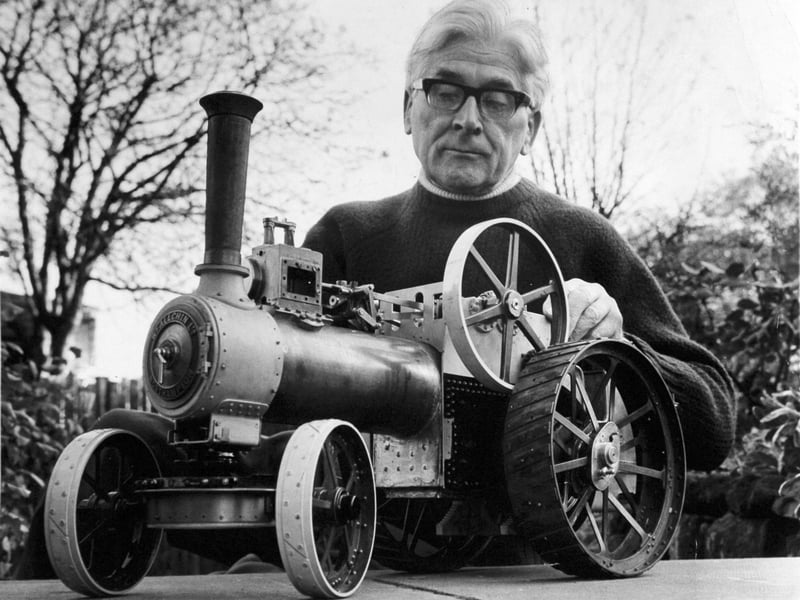 Retired engineer Alastair Cameron pictured in November 1971 with a model steam engine which he has been making for nearly four years in the workshop at his Roundhay home.