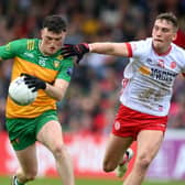 Tyrone’s Conn Kilpatrick in action against Donegal's Niall O'Donnell.
