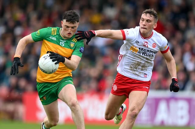 Tyrone’s Conn Kilpatrick in action against Donegal's Niall O'Donnell.