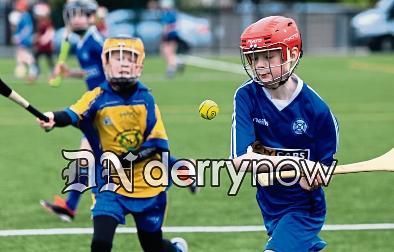 Rosemount player prepares to hit the sliotar up the field.
