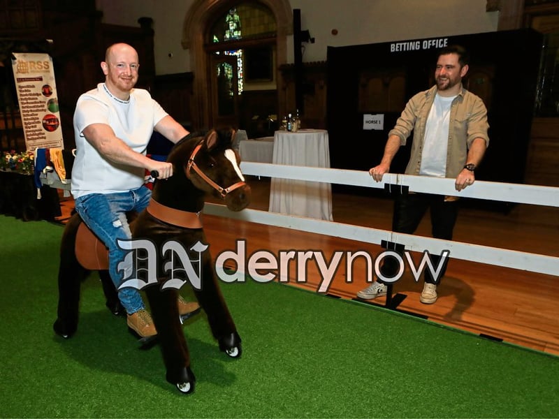 Martin Hasson on horseback at "Giddy Up" event held in the Main Hall, Guildhall, the Mayor’s Charity night, in aid of the Ryan McBride Foundation and Foyle Hospice. Looking on is Ronan Doherty.