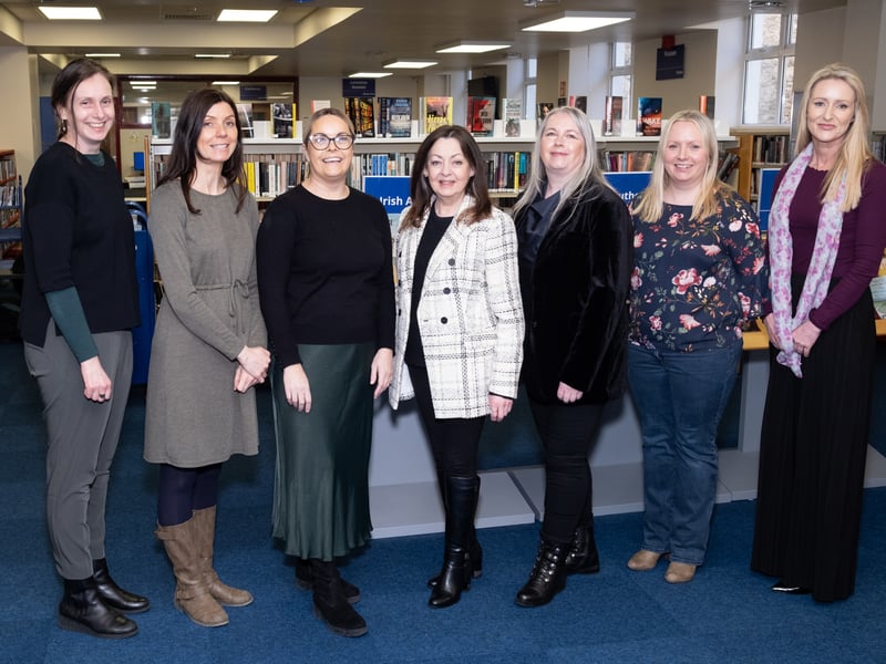 Internationally renowned and much-loved Irish singer, performer and author, Sandy Kelly, pictured with Dungarvan Library staff Debbie Johnston, Caroline Power, Catherine O'Mahony, Mary Conway, Sarah Fraher and Suzanne Stenson in Dungarvan Library for a Writers at Waterford Libraries series event - David Clynch