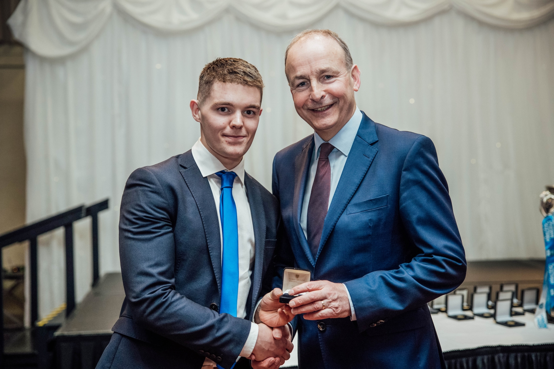 MIC's Fitzgibbon Cup winning team were celebrated at a special Homecoming Gala dinner at the Strand Hotel in Limerick recently. Micheál Martin with PJ Fanning (Mount Sion) Tánaiste Micheál Martin was in attendance to present the players and management with their medals. Also on the night, the Tánaiste launched Cumann na mBunscol: Caoga Bliain ag Fás, stunning publication celebrating 50 years of Gaelic Games in Primary Schools, written by MIC alumni Ciarán Crowe and Joe Lyons and published by MIC.