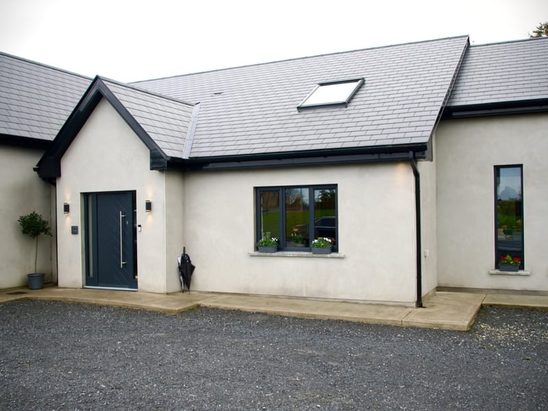 Aoife Culliton and Kristian Fisher live in their self-build home in Co. Cork with their two young children. They completed the build in 2022. The couple had always wanted to build their own home and after finding their site, they started the building process. Aoife and Kristian used 3D house modelling software to design their home, getting guidance along the way from Kristian’s dad, David, who is in the building industry. Aoife and Kristian were involved in every aspect of the process and describe their style as modern industrial, which is reflected in the black steel trims and warm wood accents throughout. They love the individuality and uniqueness of their home especially the mezzanine area. The family love that their home has great open plan living but still maintains places to retreat to if you need some peace and quiet.