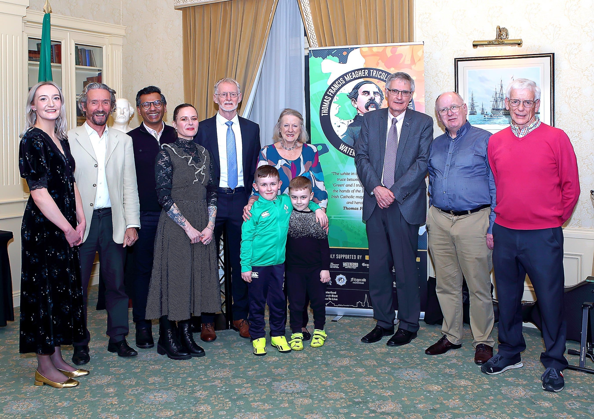 Launch of the Thomas Francis Meagher Tricolour Celebrations in the Granville Hotel, Waterford, on Wednesday February 21, 2024. From l-r, Áine Whelan, Barry Kennedy, Dinesh Lalvani, Sarah Jane Cleary, Eamonn McEneaney, Chairperson, Ann Cusack, Vice-chairperson, Eugene Broderick, Secretary, Joe Geraghty, Walter O'Leary and in the front was Aaron and his brother Stevie Mulrooney, star vocalist of Ireland's Call at the recent Irish rugby Six Nations game against Italy and of course the Toy Show on RTE who will be performing at the Gala Dinner on Saturday 2nd March in the Granville Hotel.  The star of the night was of course 8-year-old Stevie Mulrooney, star vocalist of Ireland's call at the recent Irish Rugby Six Nations game against Italy and of course the Toy Show on RTÉ. Stevie stole the show in the Granville Hotel as he posed for photos with his family and anyone else who saw him there. He will be performing at the Gala Dinner on Saturday March 2 and you can also join him and his family on Sunday March 3 as the 176th anniversary of the first raising of the Tricolour in Waterford is marked.