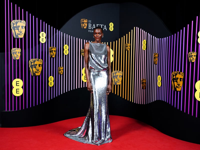 The Woman King star Sheila Atim – who was nominated for the EE Rising Star Award at last year’s event – continued the growing trend for sequins on the runway. Her elegant silver dress had a drop waist, boat neckline and dramatic skirt.