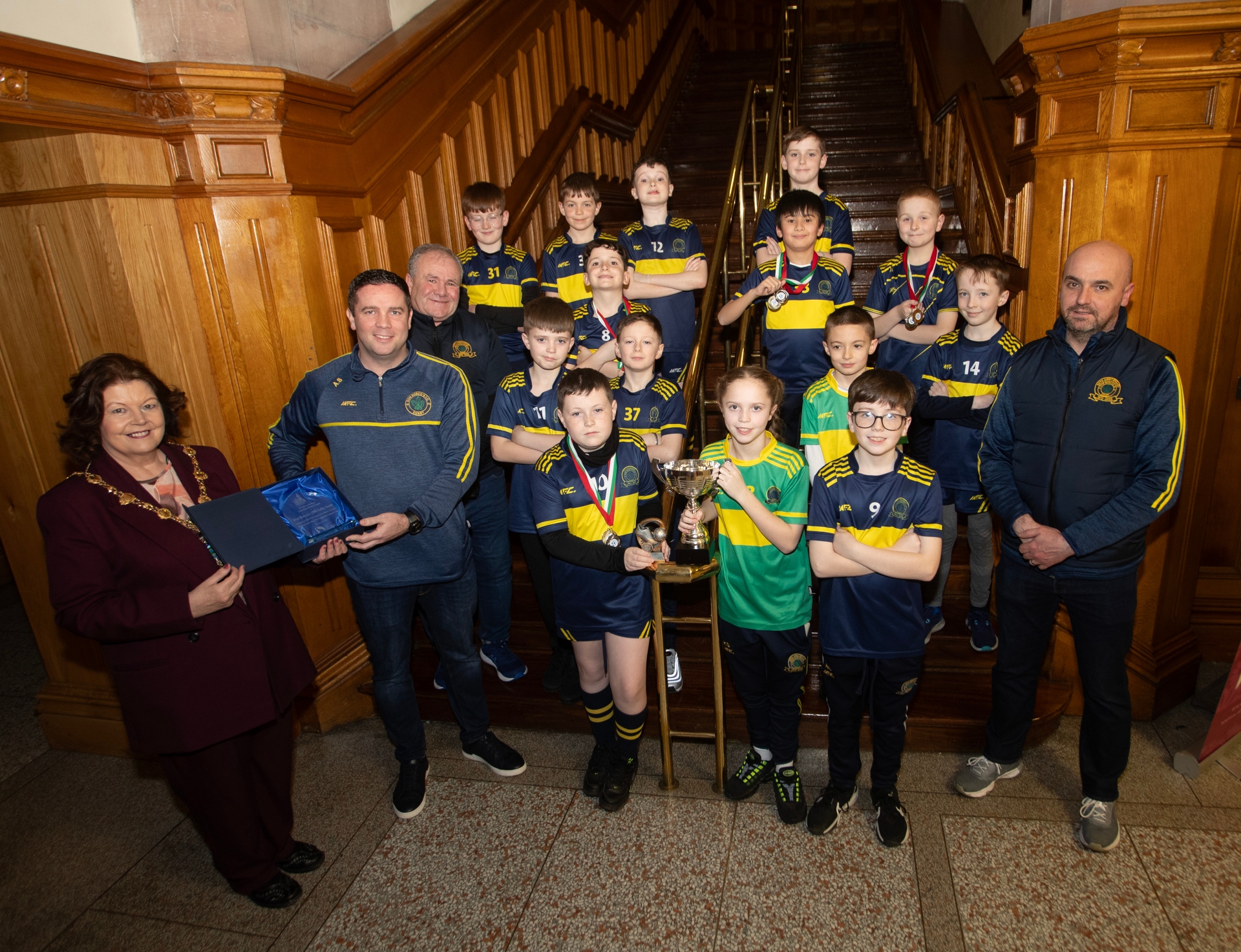 The Mayor of Derry City and Strabane District Council, Patricia Logue making a special presentation to Don Boscos Colts u-13 manager Aaron Starrs to mark the successful season the team had this year, winning the D&D League One Winter Cup and runners-up in the League One Summer Cup. Included are coaches Vinny Brady and Peter Doherty. (Photos: Jim McCafferty Photography)