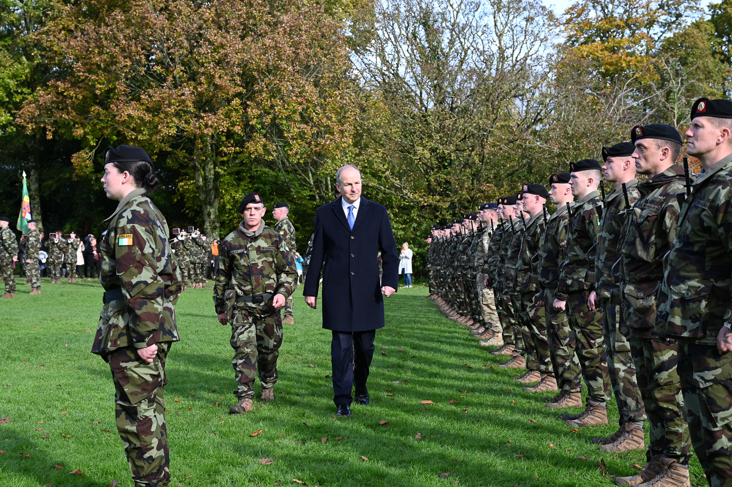 Today, the Tánaiste and Minister for Defence and Foreign Affairs, Micheál Martin TD reviewed the members of the 123rd Infantry Battalion who will shortly deploy to Lebanon as part of the United Nations’ Interim Force (UNIFIL).   The Tánaiste was accompanied by the Secretary General of the Department of Defence, Jacqui McCrum and the Chief of Staff of the Defence Forces, Lieutenant General Sean Clancy.   The Tánaiste had special words for the families of the members of the 123rd Infantry Battalion.   “I know that the current situation in the Middle East, including in the area of South Lebanon and Northern Israel is a matter of grave concern to you and I understand that this is a worrying time for you. I want to reassure you that the troops standing before us today – your sons, daughters, partners, dads and mums – are well trained, well prepared and well equipped for this deployment,” he said.   Soldiers from 25 counties around Ireland are represented among the 342 strong contingent deploying to UNIFIL.    More than a quarter of the group are about to deploy on their first tour of duty overseas.   Addressing the 123rd Infantry Battalion, the Tánaiste reflected on the value of Peacekeeping against the backdrop of escalating activity in South Lebanon.   “Peacekeeping is the most important international action for good that any nation can participate in. Your role, as part of UNIFIL, is to provide a safe and secure environment and to support local communities where they are deployed.    This commitment to those communities and to vulnerable citizens lies at the heart of Ireland’s engagement in UN-Mandated crisis management operations and it has never been more relevant in light of the ongoing situation in the Middle East.”   The Tánaiste went on to say ‘In my capacity as Minister for Foreign Affairs, I am particularly conscious of the importance of this tradition as an essential component of Ireland’s foreign policy and your participation in UNIFIL illustrates the very