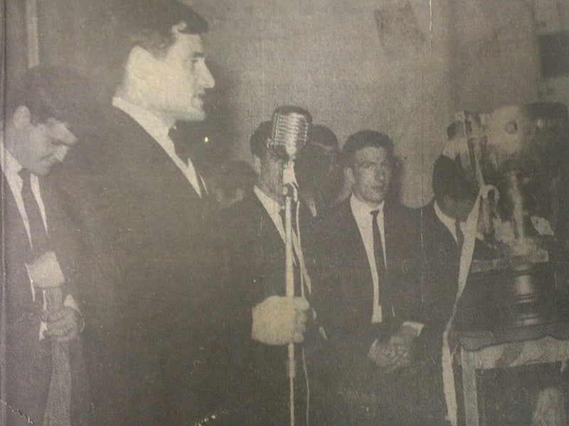 Caption: 1966 National Football League Final ‘Proper’ Homecoming: Longford captain Brendan Barden addresses the huge crowd that gathered in Longford town on Monday, October 10, 1966 as the victorious team returned home with the NFL Trophy after their 1-18 to 0-17 aggregate win over New York. Also in the photo are Jimmy Flynn (left), Sean Murray and Sean Donnelly.
