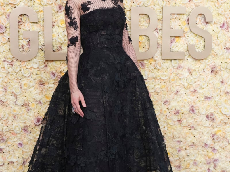 Pop star Dua Lipa, who was nominated for best original song, wore a custom Schiaparelli gown, the black strapless design featuring golden embroidery on the bodice and a voluminous hem.