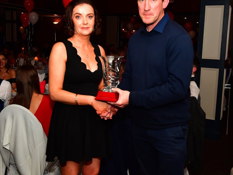 Caption: Chairperson Melissa Walshe being presented with the Club Person of the Year award by Longford manager Paddy Christie Picture: Frank McGrath 