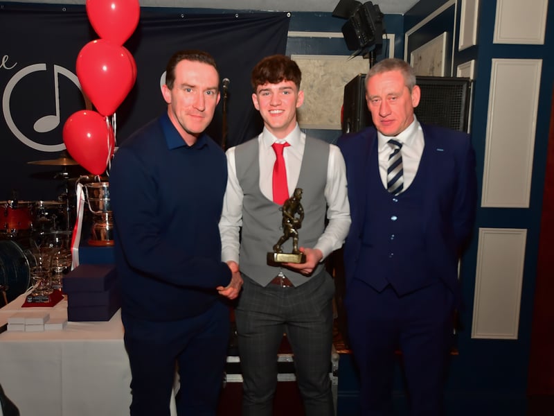 Caption: Longford manager Paddy Christie presents the Ballymahon Young player of the Year award to Darragh Finlass at the club's dinner dance and awards presentation last Saturday, February 4 in the Rustic Inn, Abbeyshrule Picture: Frank McGrath
