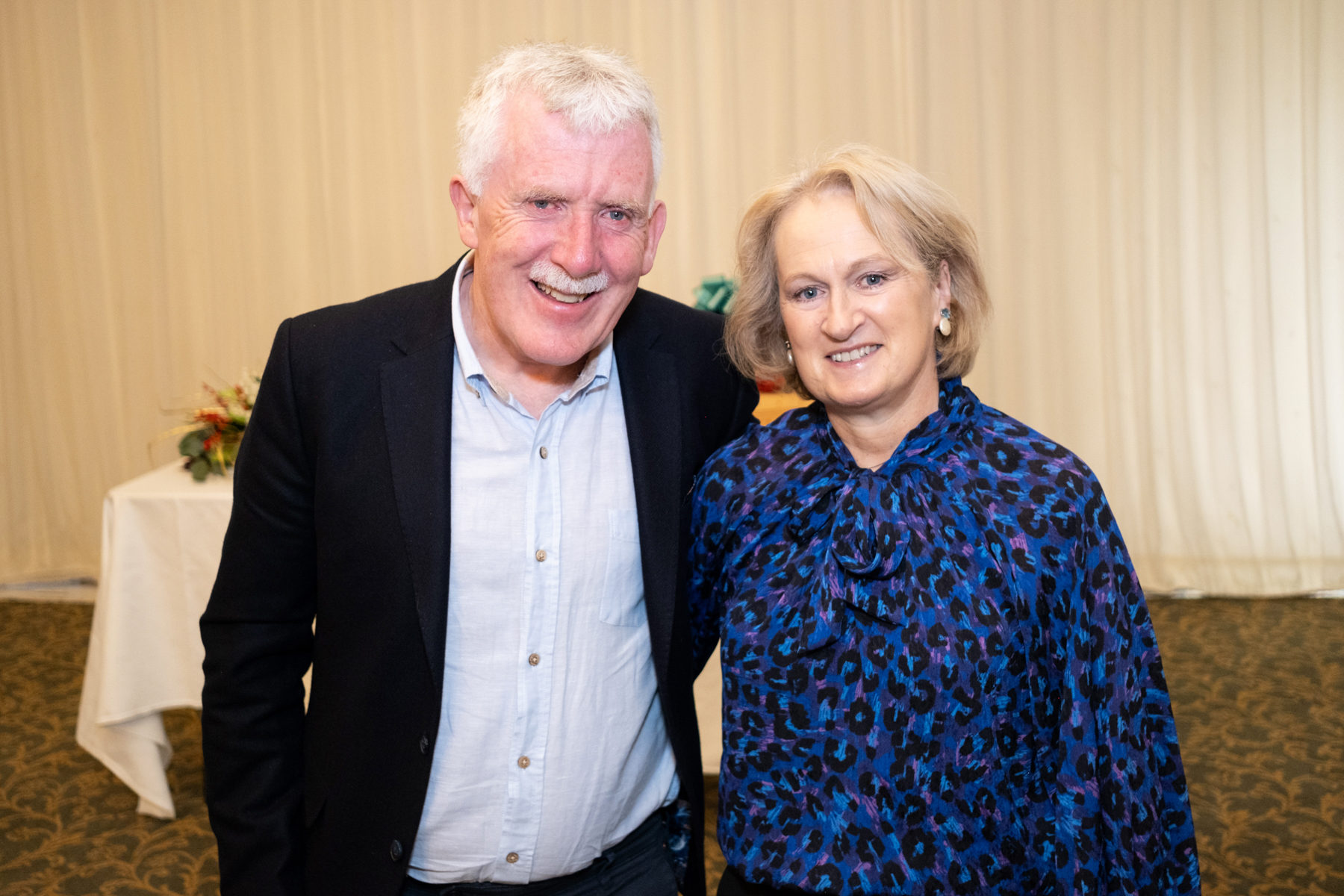 After 32 years as CEO of Waterford Leader Partnership (WLP), Jimmy Taaffe is retiring from his role. Family, friends, work colleagues and board members gathered together last Friday Dec 15 for a reception in the Park Hotel Dungarvan to acknowledge his contribution to the county of Waterford and congratulate him for such service. Jimmy always welcomed community and individual development with the bottom up led approach to steering successful projects in Waterford County. WLP was formed in 1991 and is one of 49 local development companies in Ireland. Local Development Companies (LDCs) are multi-sectoral partnerships that deliver community and rural development, labour market activation, social inclusion, climate action and social enterprise services. Under Jimmy Taaffe`s guidance and leadership WLP have become one of the lead funders of rural development in Waterford. Jimmy Taaffe from Waterford Leader Partnership and his wife Bridget pictured at the Park Hotel Dungarvan - Photo by David Clynch There are many highlights over his career like the more recently Blackwater Valley Economic Development Zone with offices in Villerstown, Tallow, Cappoquin & Lismore. The successful skatepark in Dungarvan town is proving a huge hit and attraction for budding outdoor enthusiasts. The various on-farm businesses – from Ice cream production in both East & West Waterford to cheese making in Knockanore, is helping keep employment in rural areas thrive. Engineering firms have benefitted throughout the county with essential equipment, tourism has been boosted with camping pods are offering additional income to smaller villages, The Blackwater Distillery is an added huge addition to Ballyduff Upper and the various community groups and sporting organisations who have benefited from Leader have all found Jimmy and his team underpinning this vital funding. We wish Jimmy the very best in his retirement and to Bridget all the very best in their future exploration of the world.
