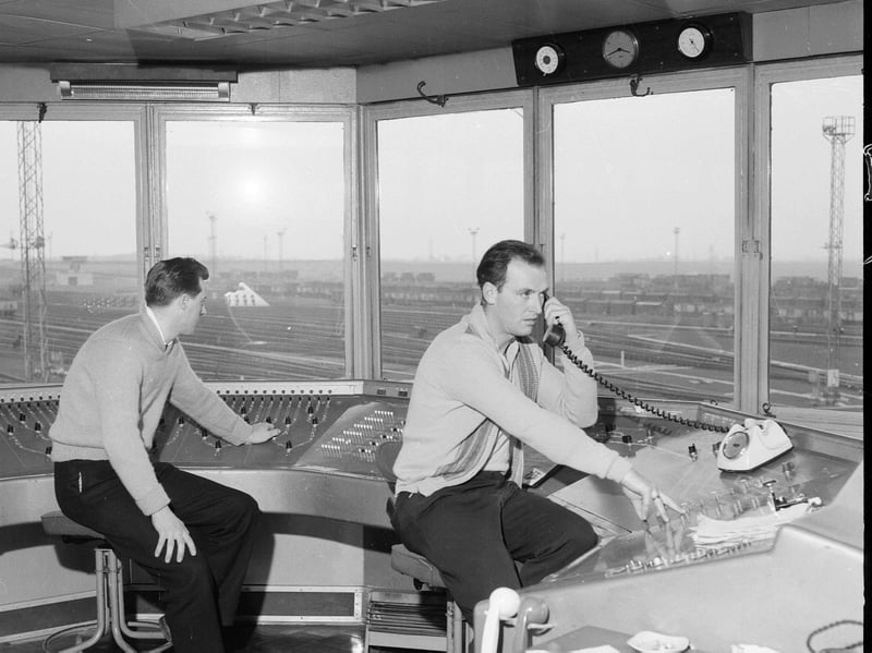 Railway men at work at a control tower in Millerhill Yard, in 1964