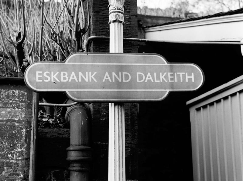The sign at the old Eskbank and Dalkeith railway station, one of the stops on the Edinburgh & Hawick Railway route, which closed in January 1969