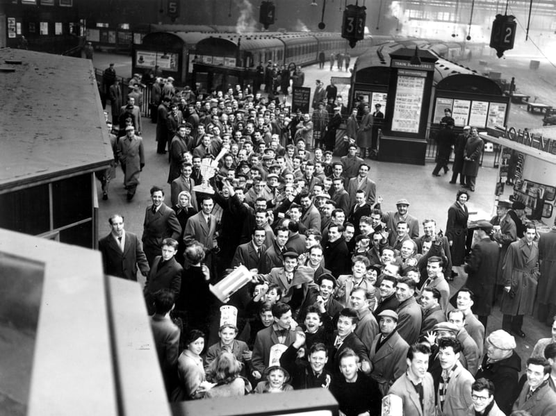 Hibs fans queue at Edinburgh's Princes Street station (aka Caley station/Caledonian station) for the special train to Glasgow in March 1959. It was to end in disappointment, as the Scottish Cup tie ended in a 2-1 win for Third Lanark.