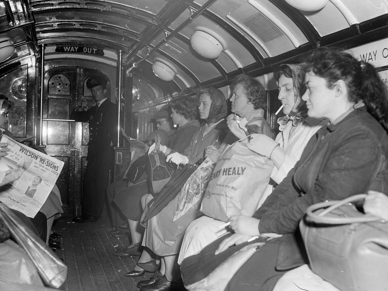 Glasgow housewives going home on the underground train after a day's shopping in 1962