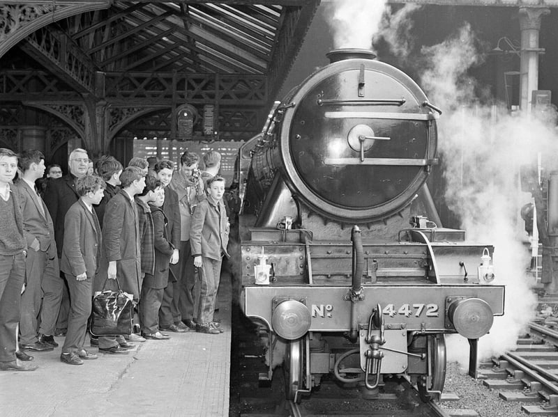 Trainspotters gather to see the Flying Scotsman as she leaves Waverley station in Edinburgh for Aberdeen in May 1964