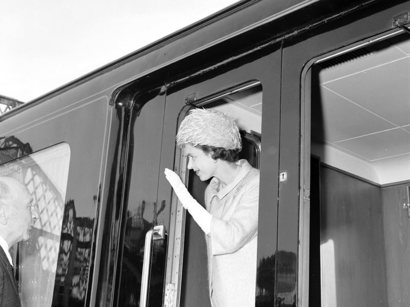 Queen Elizabeth II waves from her train at Stow Station in the Borders, in 1966