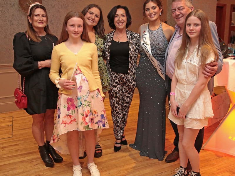 Caption: Ally Cornyn, Assumpta Reilly, Katie McGinnity, Therese and Grace Cornyn, Emily and Milo Reilly