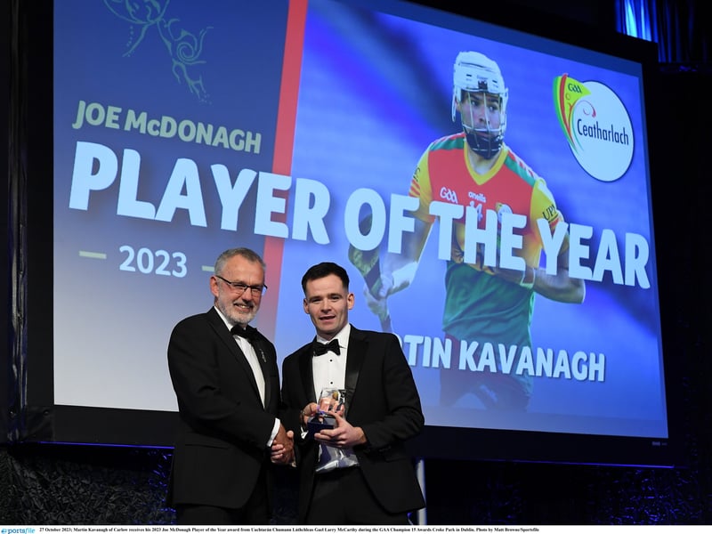 OCTOBER 2023 Martin Kavanagh of Carlow received his 2023 Joe McDonagh Player of the Year award from Uachtarán Chumann Lúthchleas Gael Larry McCarthy during the GAA Champion 15 Awards Croke Park in Dublin.