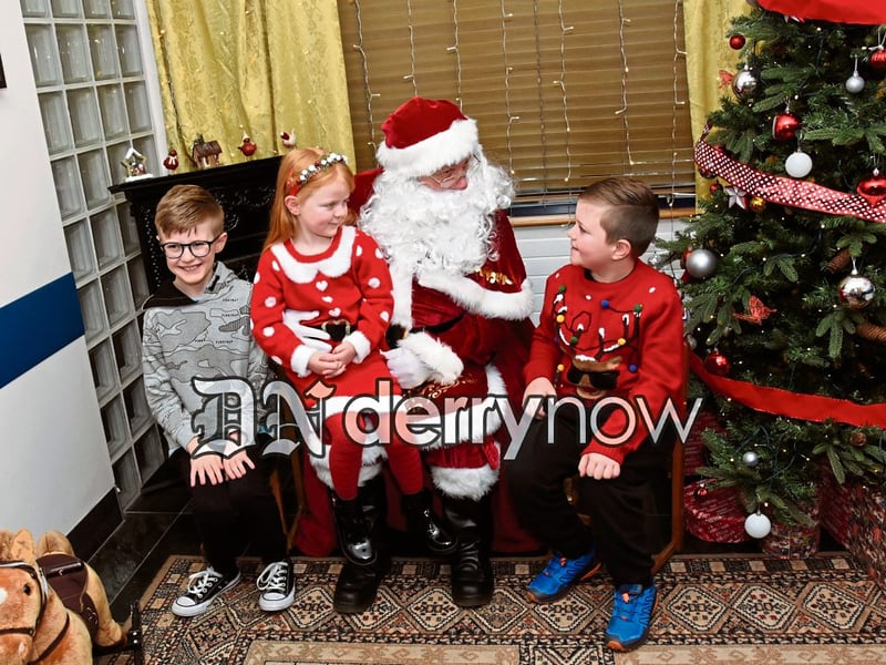 The Houston children meet Santa at Derry Credit Union