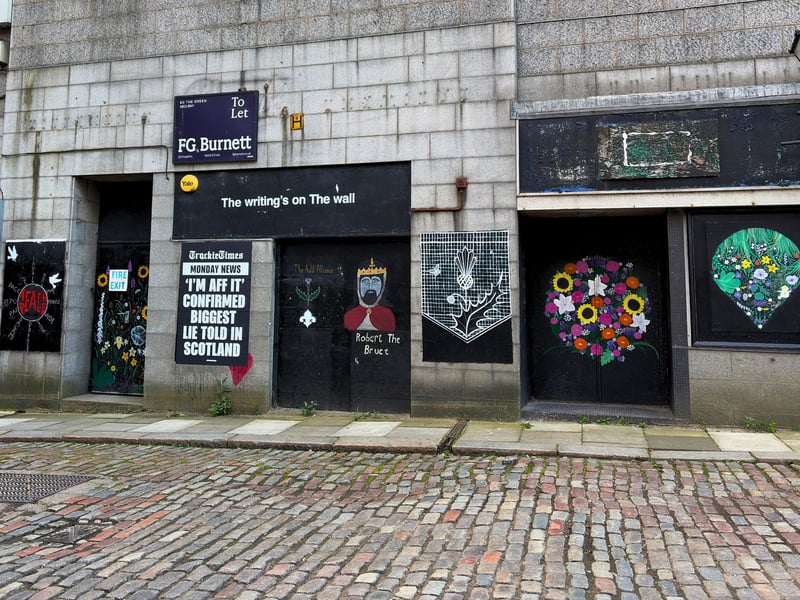 In addition, there are more pieces, such as a paste up from Trackie McLeod at the Green alongside works from other artists such as Aberdeen’s Graffiti Grannies.