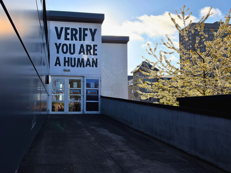 Having previously participated in Nuart back in 2019, dr.d AKA Subvertiser has created this mural which pokes fun at verification steps online at North East Scotland College. 
