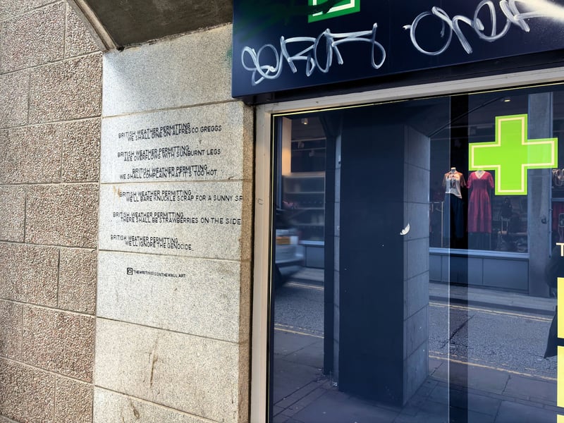 Located beside Boots on Harriet Street nearby is the first of several works from The Writing Is On The Wall dotted around Aberdeen which are part of Nuart 2026. 
