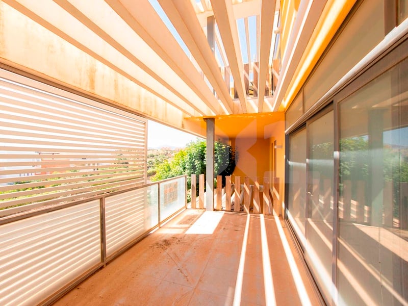 It has two-bedrooms and two bathrooms as well as a terrace and swimming pool.