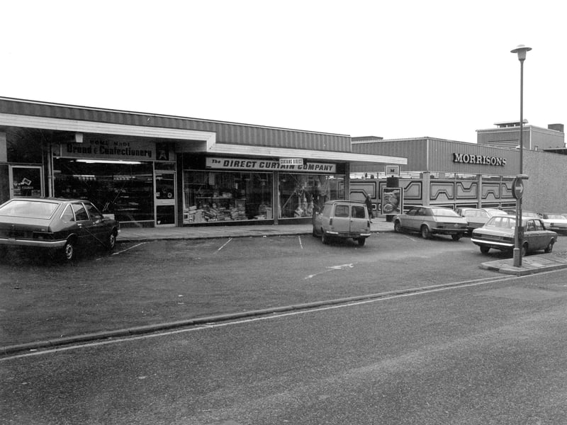 The High Street in December 1979 with Morrisons supermarket on the right and shops that were built as part of the Morrisons complex on the left. These were addressed as Cliffe Court eventually.