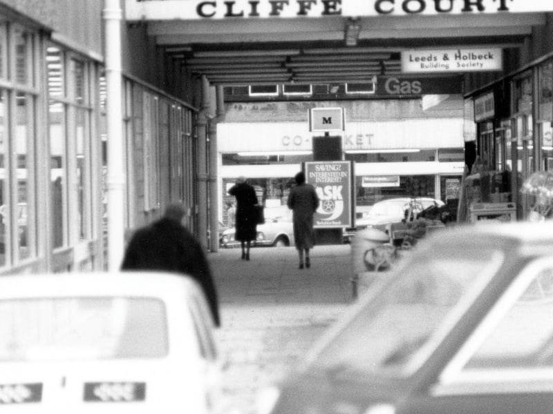 Cliffe Court looking towards the High Street from Morrisons Car Park. Morrisons supermarket is on the left, and shops which are part of the complex are to the right. Pictured in December 1979.