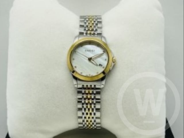 Gucci, Model: Gucci G Ladies, Model Number: 126.5, Movement: Quartz, Dial: Mother of pearl with Diamond Markers and Gold Hands, Case Diameter: 27mm, Case: Stainless Steel, Bezel: Gold Plated Smooth, Bracelet: Stainless Steel and Gold Plated Gucci Bracelet with Folding Clasp, Box: Yes