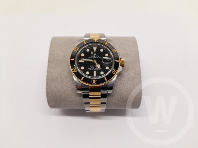 Rolex, Model: Submariner, Model Number: 116613, Movement: Automatic, Dial: Black with Gold & Luminous Markers and Gold Hands, Case Diamater: 40mm, Case: Stainless Steel, Bezel: 18 Carat Gold Black Ceramic Unidirectional, Bracelet: Stainless Steel & 18 Carat Gold Rolex Oyster, Box: No