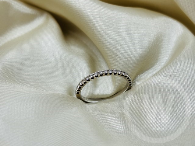 Diamond Ring, Diamond Set Band Ring Mounted in 18 Carat White Gold, 19 Modern Round Cut Diamonds in a Single Uniform Row, A Graduated Court Band Grain Set on One Side, Estimated Carat Weight: 0.20 Carat [0.01 Carat Each], Gross Weight: 2.01g, Box: No