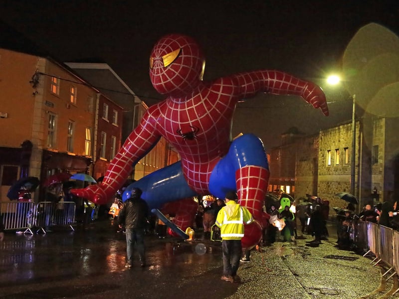 Caption: Spiderman prowling the streets of Longford during the Dead of Night Festival parade