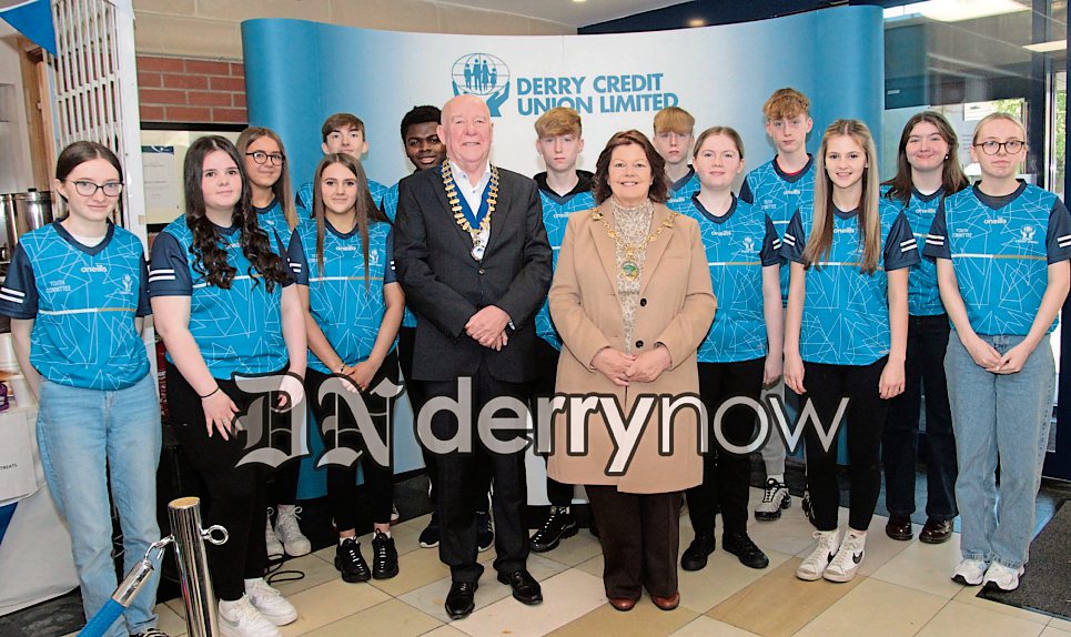 Mayor Patricia Logue and Colm McCauley, President Derry Credit Union, pictured with the Youth Committee at the International Credit Union Day event, held in the Derry branch. (Photos - Deirdre Heaney, nwpresspics)