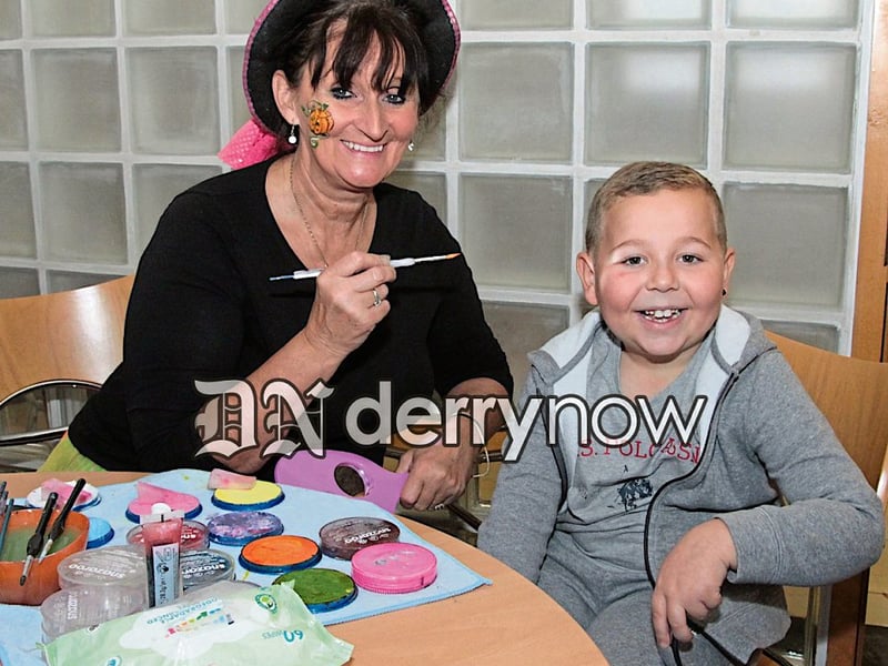 Charlie Mark Morrow has his face painted by Kate, BM Promotions.