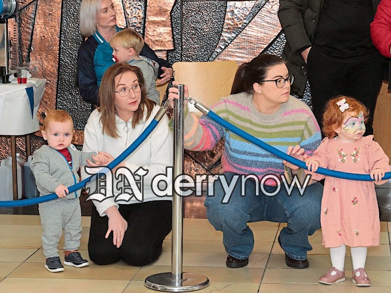 The little ones with their mums watching the dancers.