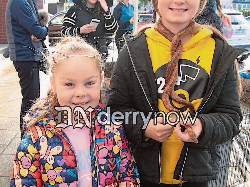 Cadhla and Aibhlinn McGeoghegan with Sally the snake.