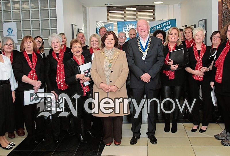 Mayor Patricia Logue and Colm McCauley, President Derry Credit Union pictured with the Momentum Choir after their performance. (Photos - Deirdre Heaney, nwpresspics)
