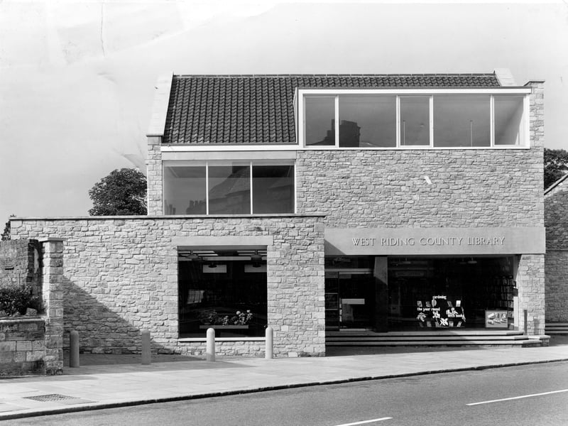 The newly-built Wetherby County Library at number 17 Westgate. circa 1965. The stone building has a lecture room and facilities for the exhibition of historical objects on the floor. It has a glass frontage to maximise the natural light on the ground floor.