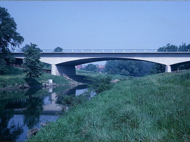 Wetherby Bypass pictured in 1964. was constructed between October 1957 and October 1959 by Crowley Russell and Co. Ltd. and the Cementation Company. It cost over £600,000 and included this new bridge spanning the River Wharfe.
