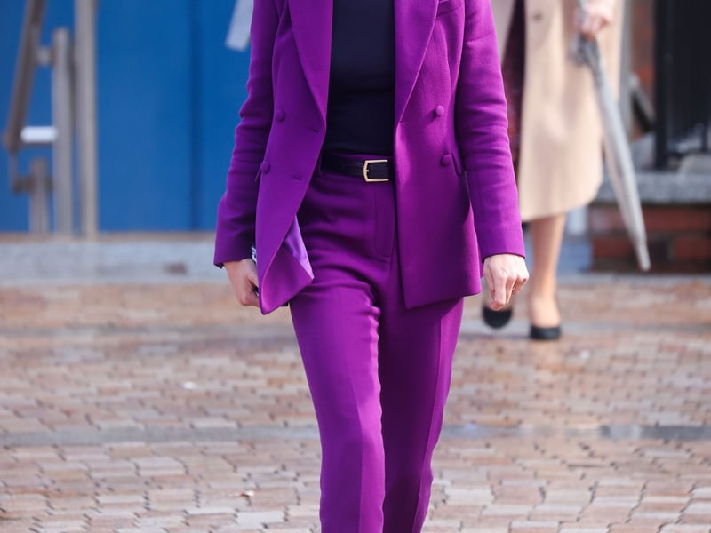 And during a visit to University Magee campus in Londonderry, Northern Ireland, in 2021, Kate went for a slim-fit Emilia Wickstead trouser suit in magenta, over a roll-neck jumper.