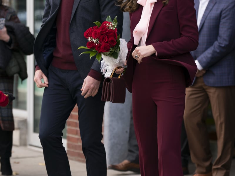 In Boston, in December 2022, she went for a burgundy suit by Roland Mouret – along with a pussy bow shirt and a Chanel bag that’s been seen on numerous occasions.