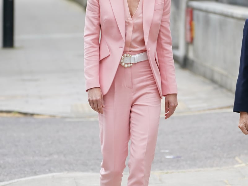 Back in May she went for a colour blocking baby pink Alexander McQueen suit for a visit to the Foundling Museum – matching a pearl belt with court shoes.